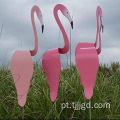 Escultura ao ar livre de flamingos